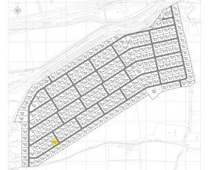 A detailed black-and-white plot map showing numerous numbered parcels of land, including "Plot 597," highlighted in yellow for emphasis. Located in GU3 1DQ Guildford, this plot is available for sale by auction with Palace Auctions. The map includes a grid overlay and visible roadways.