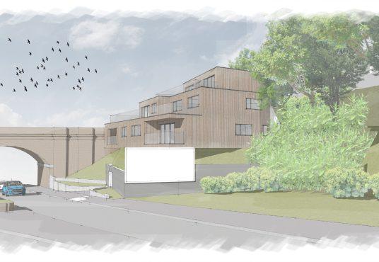 Property for sale by Auction A digital rendering depicts a residential development with modern wooden buildings on a sloped landscape. Trees and shrubs surround the area, hinting at the plot of land with hope value for planning consent sold nearby. A large concrete arch supports an elevated road, with a few cars parked below while birds fly in the sky. Presented by Palace Auctions