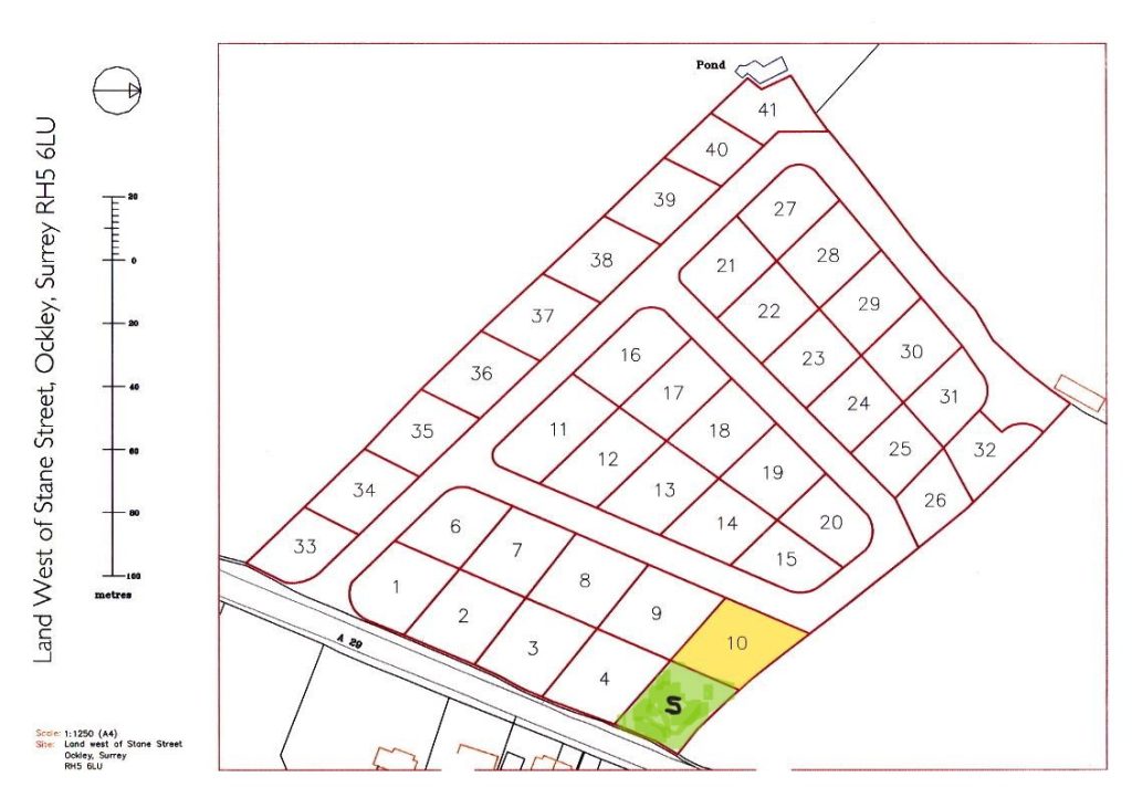 A map showing a plot layout of a land development site at Land West of Stane Street, Ockley, Surrey RH5 5LU. The site is sectioned into numbered plots, with plot 10 highlighted in yellow and an area marked with an "S" in green. Sold by Palace Auctions.