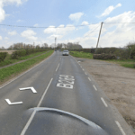 Rural road B6200 with open fields, indicating access to land at Beech Farm for sale by auction
