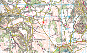 Property for sale by Auction A detailed topographical map showing Warlingham, Woldingham, and surrounding areas. The map includes roads, pathways, contour lines indicating elevation, various landmarks, and specific locations marked with numbers and symbols. Presented by Palace Auctions