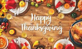 Property for sale by Auction A festive table setting with autumn-themed decorations, including pumpkins, leaves, and vibrant fruits. Plates and cutlery are arranged around the table, and the words 