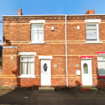 Property for sale by Auction A row of connected two-story brick houses with white-framed windows and doors. Each house has a small rectangular window on the upper floor and a larger window on the lower floor. A street sign reads "Edgeware Street. Presented by Palace Auctions