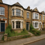 Property for sale A row of old, two-story brick townhouses, with the center house showing peeling paint and overgrown plants—a prime SE24 house refurbishment opportunity contrasting with its neater Herne Hill property investment neighbors. Presented by Palace Auctions