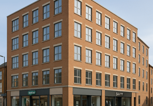 Property for sale A modern, four-story brick mixed-use investment in Wisbech stands on a quiet street corner, featuring large windows and ground-floor shops like "Savvy." Located at PE13 1AF, this property offers great one-bed apartment block potential. Presented by Palace Auctions
