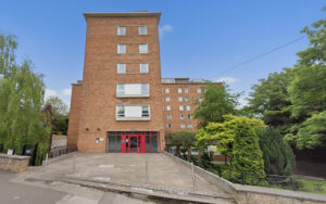 Property for sale A brick building with red doors, perfect for a Nottingham one-bedroom flat investment. Presented by Palace Auctions