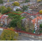 Property for sale Aerial view of a property with multiple houses and trees, outlined in red, at the corner of Creswick Road and Acton in a suburban neighborhood, with rows of houses and greenery visible in the background. Presented by Palace Auctions