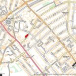 Property for sale A street map of the Kilburn area in London highlights roads, parks, educational facilities, and Grade II listed London sites. A red arrow indicates a spot near Kilburn High Road. North is marked and a 500-meter scale bar is shown. Presented by Palace Auctions