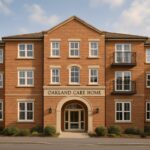 Property for sale A modern three-story brick building with white-framed windows and an arched entrance, "Oakland Care Home" offers a prime investment property Manchester opportunity, surrounded by shrubs and set against a clear sky. Presented by Palace Auctions