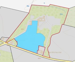 Property for sale A map outlines a Scottish manor house development with buildings, trees, and a blue pond labeled "Sks." Roads border the south side, and paths link "The Witches Hat" and "West Lodge." The label "Iss" appears at the top. Presented by Palace Auctions