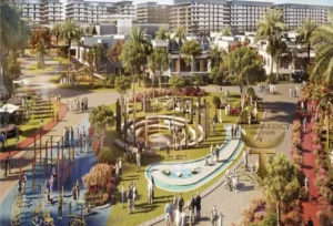 Property for sale A lively residential community park with modern landscaping, walking paths, water features, and people socialising. Multi-storey waterfront flats at DAMAC Riverside Views rise in the background beneath palm trees and a clear sky in Dubai Investment Park 2. Presented by Palace Auctions