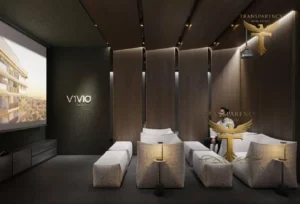 Property for sale A modern, dark-toned home theatre in a luxury flat features four rows of white cushioned seating, small side tables with lamps, wood panel dividers, and ambient lighting—perfect for an exclusive Dubai lifestyle in Jumeirah Village Triangle. Presented by Palace Auctions