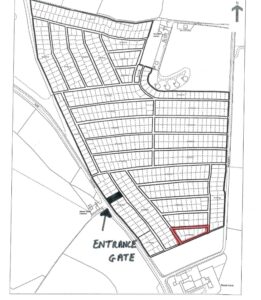 Property for sale A black-and-white map of freehold land in Warlingham, Surrey, with an entrance gate marked by a large arrow near the bottom left and one plot outlined in red towards the bottom right. Various rectangular plots are shown throughout. Presented by Palace Auctions