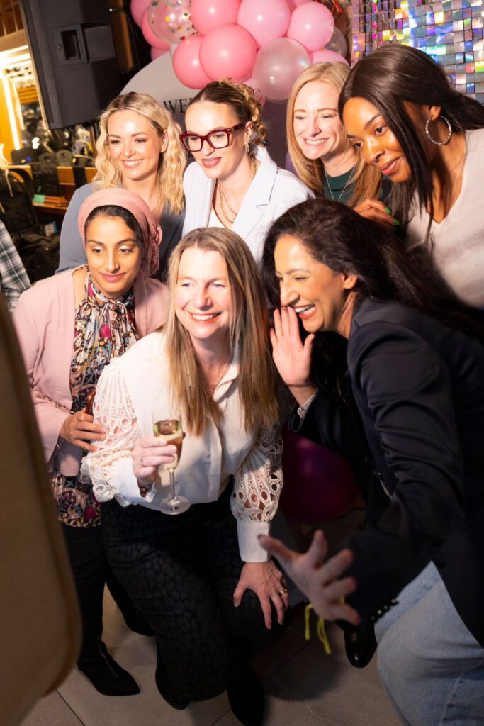 Property for sale A group of seven women pose and smile for a photo at the Essex Women’s Network Launch Event, surrounded by pink balloons and sparkling decorations. One woman at the front holds a drink as everyone celebrates the joyful Founders’ Edition. Presented by Palace Auctions