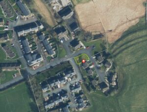 Property for sale A satellite view of a suburban neighbourhood in Ingleton, North Yorkshire, shows houses, roads, and fields. A yellow outline and red location pin highlight a Freehold Building Plot on Low Dene Rise near open grassy areas. Presented by Palace Auctions
