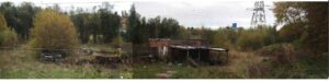 Property for sale A dilapidated brick building with a partially collapsed roof stands in an overgrown field off Lands End Road, Middleton Manchester, surrounded by trees and power lines—ideal for future development land under a grey sky. Presented by Palace Auctions