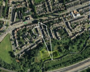 Property for sale Satellite view of a suburban area with roads, houses, green spaces, and trees. Two outlined areas highlight potential development land in Middleton near a wooded area by a river and a motorway. Presented by Palace Auctions