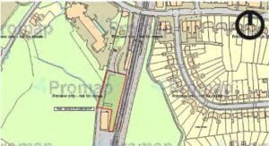 Property for sale A map showing a highlighted outlined area in red beside a road, with nearby buildings, houses, and green areas; a thick black circle marks a spot in the upper right corner. Presented by Palace Auctions